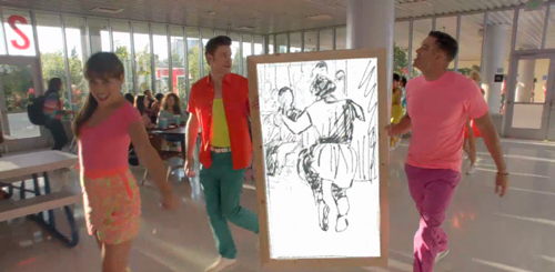 People in bright pink, orange, and teal clothing walk through a sunlit building near a large sketch.