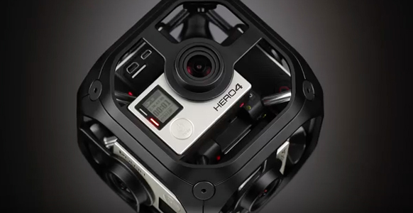 A GoPro HERO4 action camera secured within a black, multi-axis gimbal stabilizer.