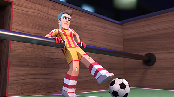 A cartoon foosball player in a red and yellow striped uniform kicks a black and white soccer ball.