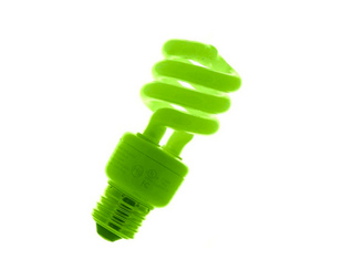 A bright green spiral compact fluorescent light bulb isolated on a white background.
