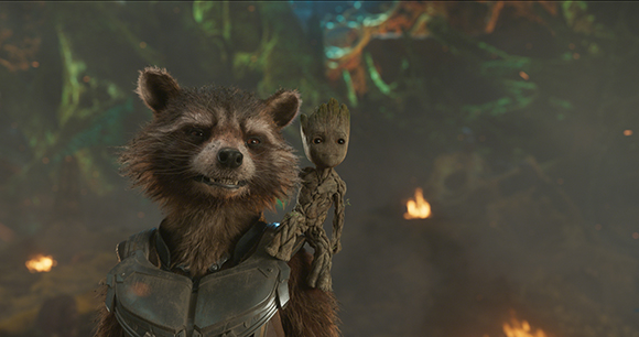 A raccoon-like creature in armor stands next to a small tree-like creature in a dark, smoky forest.
