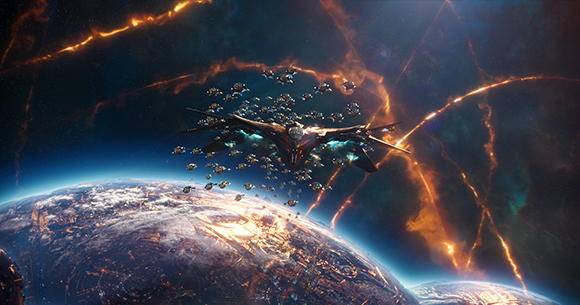 A large dark spacecraft and smaller ships fly above a glowing planet near orange energy arcs in space.
