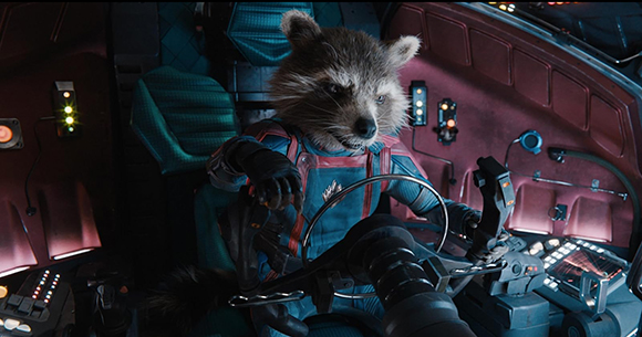 An anthropomorphic raccoon wearing a blue flight suit sits in a cockpit operating controls.