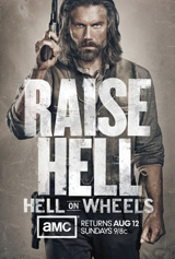 A man with long hair and a beard holds a gun, with the text 'RAISE HELL' and 'HELL ON WHEELS' overlaid.