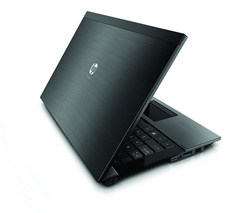 A black HP laptop partially open, viewed from a side angle against a white background.