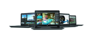 Four black laptops displayed in a row against a white background, showing various colorful screen contents.