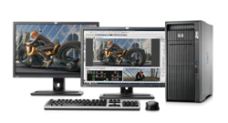 Two computer monitors, a black tower PC, a keyboard, and a mouse on a white background.