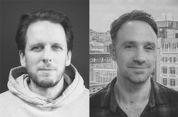 Two black and white headshots of men side by side, one in a hoodie and one in a plaid shirt.