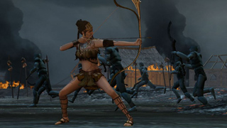 A female warrior in ancient attire aims a bow and arrow during a battle with smoke and fire in the background.