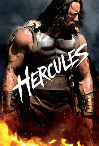 A muscular man with long dark hair and a beard wears metal armor and a fur cape amidst flames.