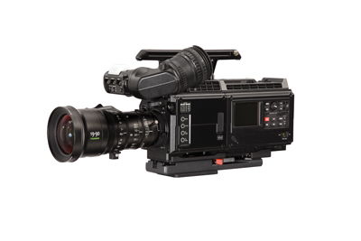 A professional black video camera with a large lens and viewfinder against a white background.