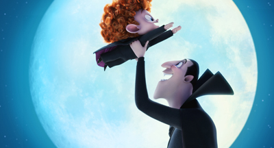 A tall vampire in black lifts a small, curly-haired child up toward a massive, glowing full moon.