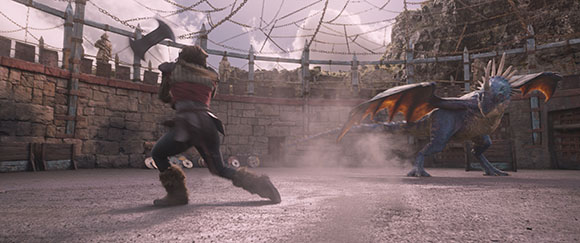A warrior holding an axe stands in a stone arena facing a large, blue winged creature.