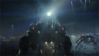 A large, dark mechanical robot stands in the rain against a bright, glowing city background.