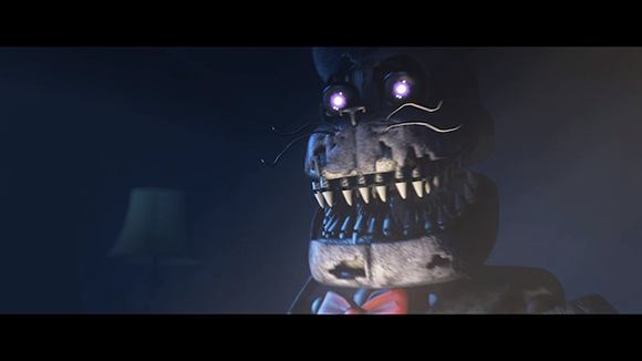 Close-up of a dark, weathered animatronic bear with glowing purple eyes and sharp, jagged teeth.