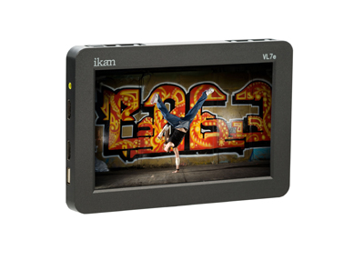 An Ikan VL7e monitor displaying a person performing a breakdance move against a graffiti wall.