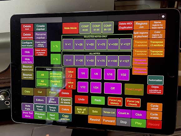 A tablet screen showing a grid of colorful buttons for music editing and MIDI controls.