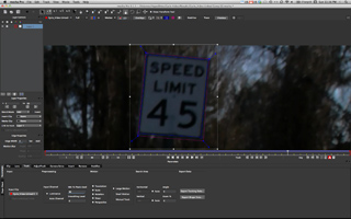 Video editing software interface displaying a speed limit 45 sign against a dark forest background.
