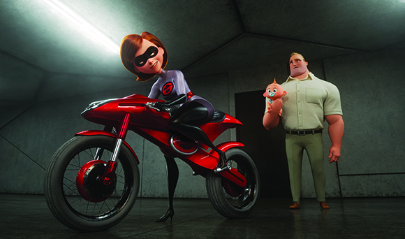 A woman in a purple superhero suit sits on a red motorcycle while a large man and a baby stand behind her.