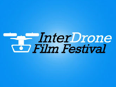White logo of a drone and the text InterDrone Film Festival on a blue gradient background.