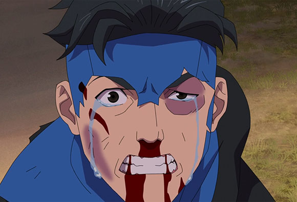 Close-up of an injured anime man wearing a blue mask with blood on his face and eyes.