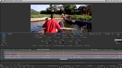 A video editing software interface displaying a clip of a person in a red shirt rowing a boat on a river.