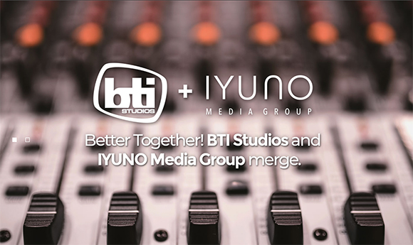 Text announcing the merger of BTI Studios and IYUNO Media Group over a blurred audio mixing board.