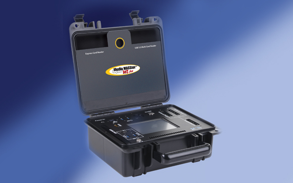 An open black protective carrying case containing a Media MASTER 102 Pro card reader device.