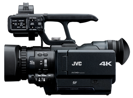 A black JVC 4K professional camcorder with a top handle and large lens.