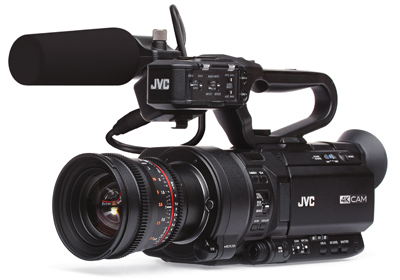 A black JVC 4K CAM professional video camera with a large lens and top handle.