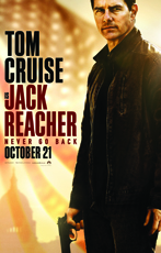Tom Cruise stands in front of a blurred American flag holding a handgun.