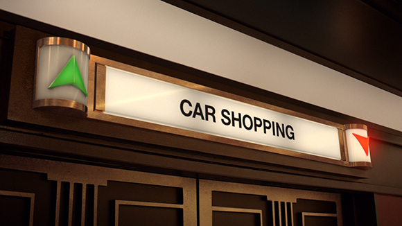 A backlit sign reading 'CAR SHOPPING' with a green arrow icon on the left and a red arrow icon on the right.