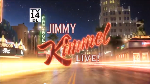 Title card for Jimmy Kimmel Live! over a blurred, brightly lit city street at night.