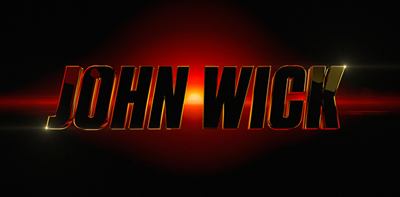 The John Wick movie title in bold, gold-edged black lettering against a dark red glowing background.