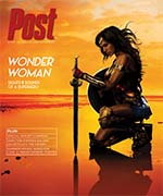 Wonder Woman kneels with sword and shield against a vibrant orange sunset.