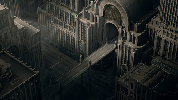 High-angle view of dark, monumental stone architecture with large arches and narrow streets.