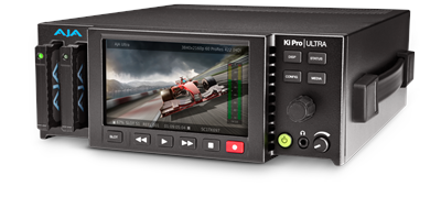 A black AJA Ki Pro Ultra media player with a built-in screen showing a red racing car on a track.
