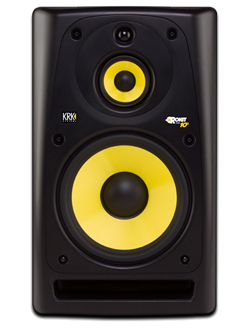 A black KRK Rokit 10 studio monitor with two yellow cone drivers.