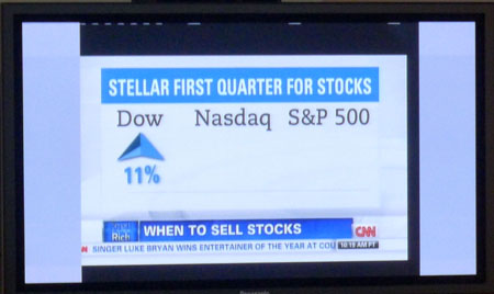 Graphic showing 'STELLAR FIRST QUARTER FOR STOCKS' with Dow, Nasdaq, S&P 500 indices and an upward arrow indicating 11% growt
