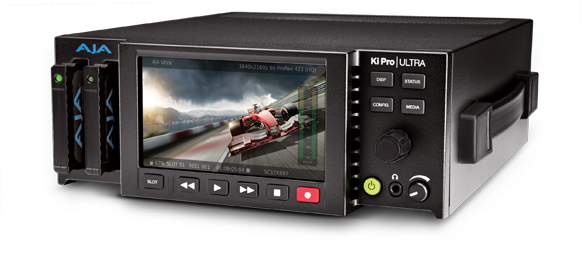A black AJA Ki Pro Ultra video recorder with a built-in screen displaying a racing car and various control buttons.