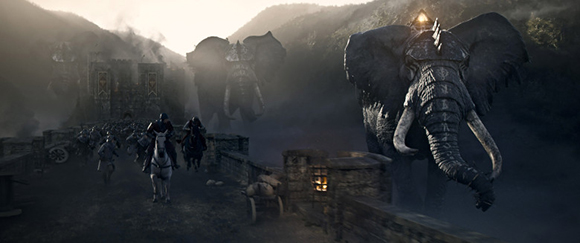 Armored elephants and soldiers on horseback move through a foggy mountain pass toward a stone fortification.