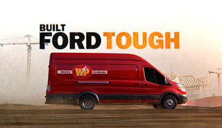 A red service van driving through dust at a construction site with large text overlay reading 'BUILT FORD TOUGH'.