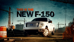 A white Ford F-150 pickup truck parked in a construction site with cranes in the background.