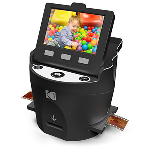 A black digital photo kiosk with a screen showing a child playing in a ball pit and film strips emerging from the sides.