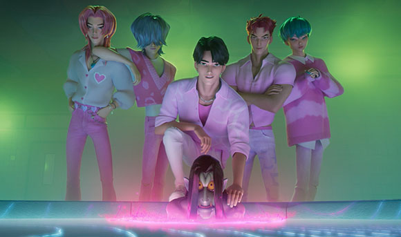 Five young men in various pink outfits pose behind a small, dark-haired creature with glowing eyes.