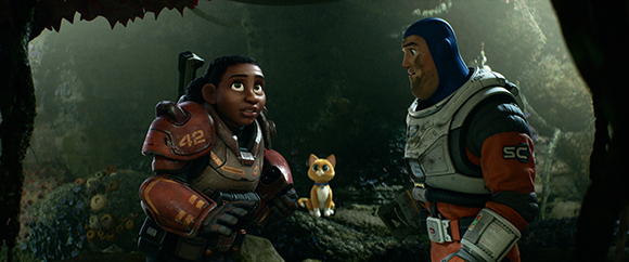 An animated girl in red armor looks up at a man in white and blue armor next to a small yellow cat in a forest.