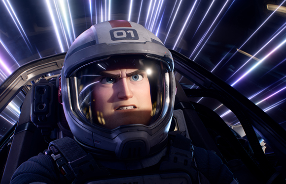 Animated male pilot in a white helmet looking intense inside a cockpit with light streaks in the background.