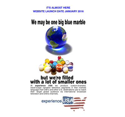 A large blue globe sits above a pile of colorful small marbles with text announcing a website launch.