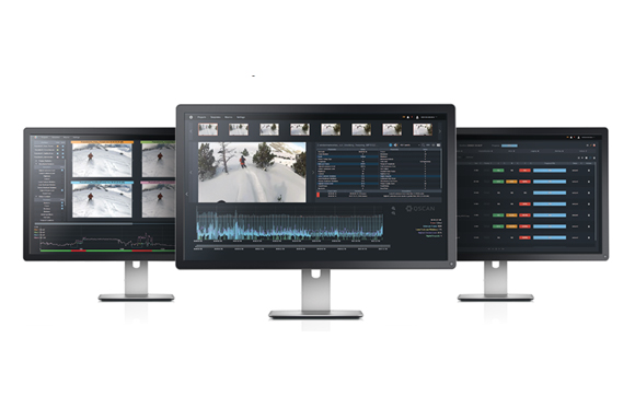 Three computer monitors showing video editing and data analysis software interfaces.
