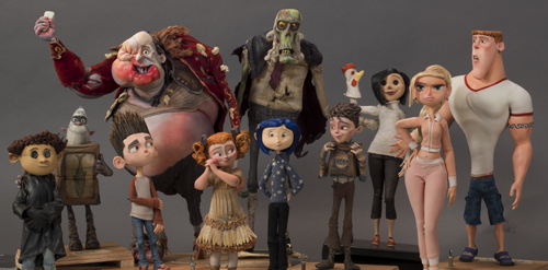 A diverse group of stop-motion animated characters standing in a row against a gray background.